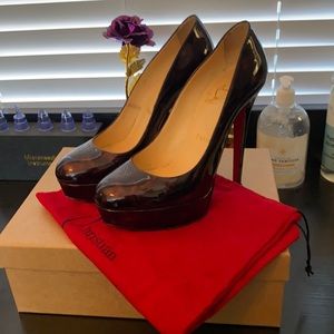 Christian Louboutin tortoise heals